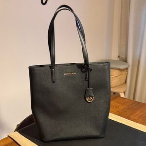Michael Kors Black Leather Tote with Gold MK Pendant